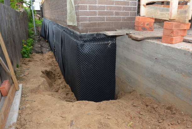 SJ Waterproofing Pros technician performing targeted Interior Drainage System assessment in Boston, GA